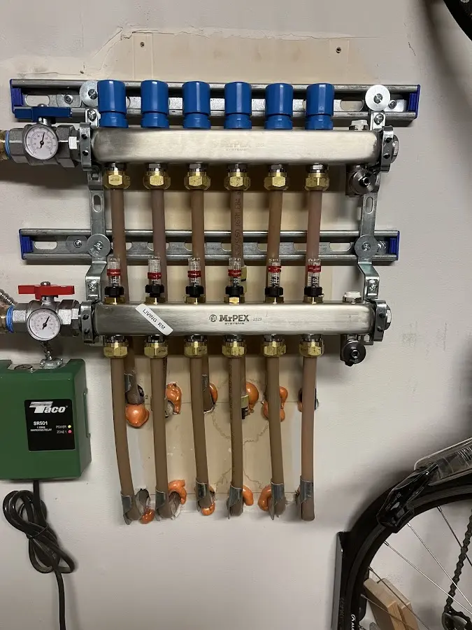 Plumber performing Gas Leak Detection at a residential property in Fircrest